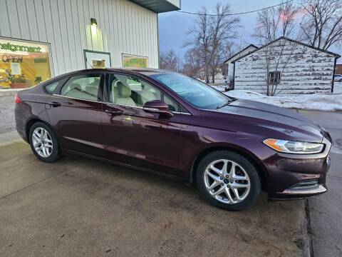 2013 Ford Fusion for sale at Hubers Automotive Inc in Pipestone MN