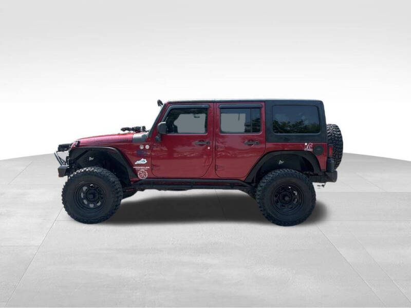 Used 2012 Jeep Wrangler Unlimited Sport with VIN 1C4BJWDG6CL230774 for sale in Maysville, KY