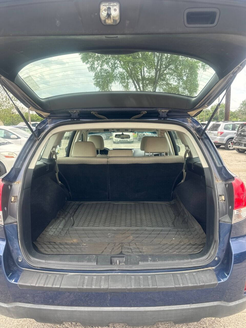 2011 Subaru Outback for sale at Calderon Auto Sales in Des Moines, IA