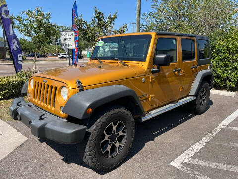 2014 Jeep Wrangler Unlimited for sale at Bay City Autosales in Tampa FL