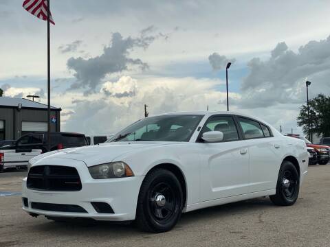 2014 Dodge Charger for sale at Chiefs Auto Group in Hempstead TX