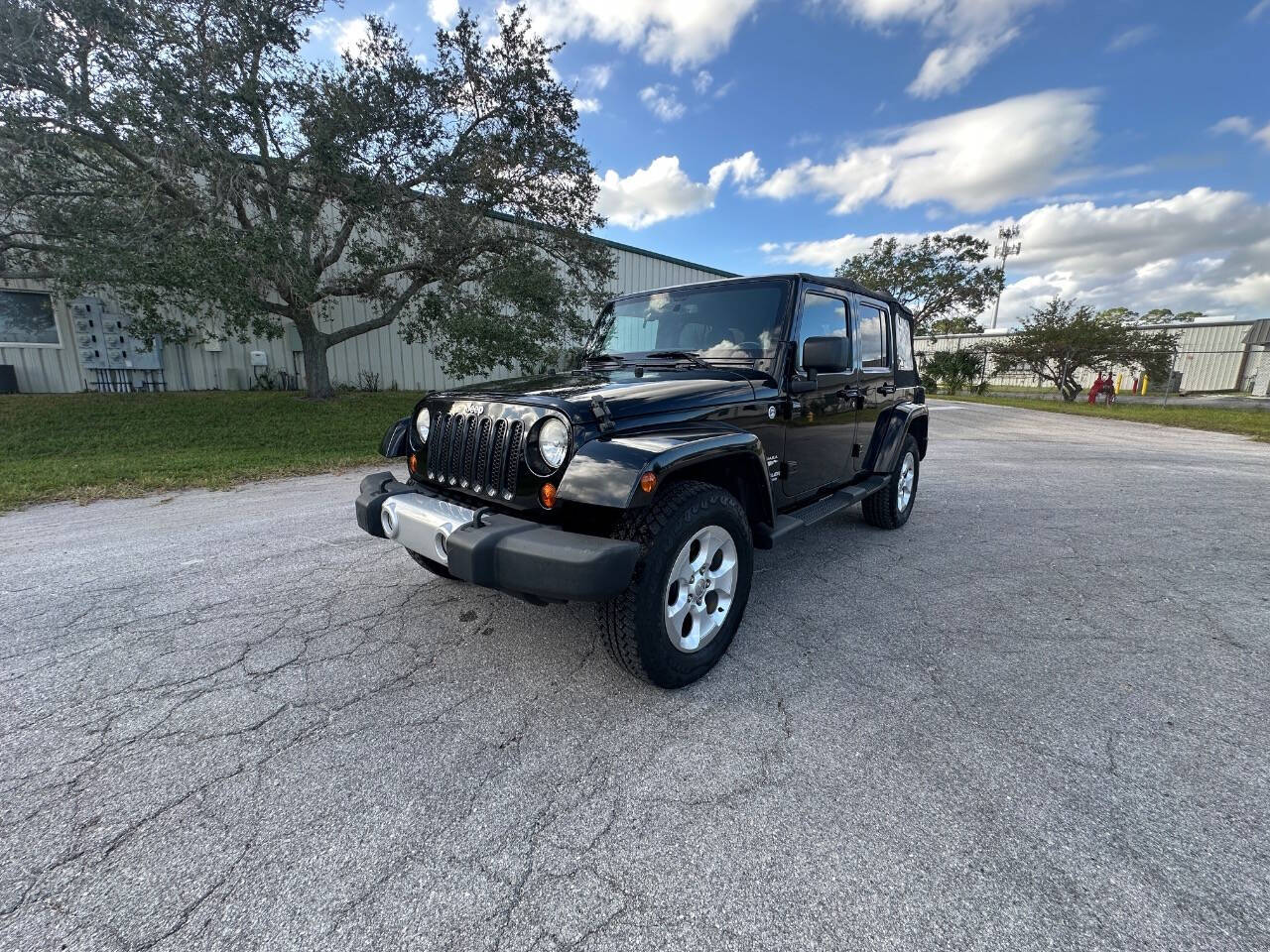 2013 Jeep Wrangler Unlimited for sale at Rubi Motorsports in Sarasota, FL