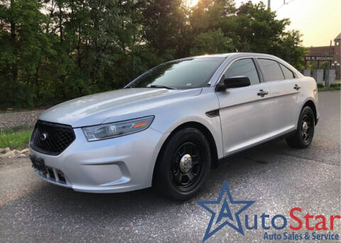2013 Ford Taurus for sale at Auto Star in Osseo MN