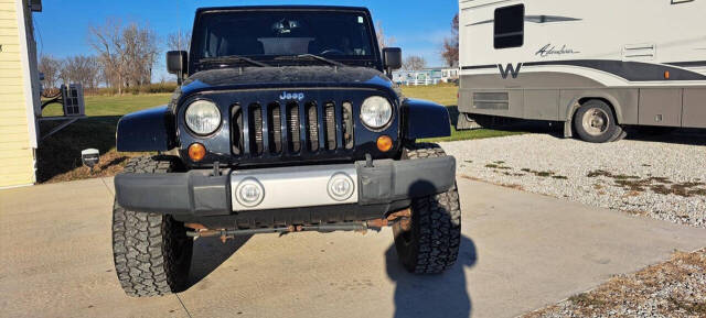 2013 Jeep Wrangler Unlimited for sale at CORNMAN AUTO LLC in Kirksville, MO