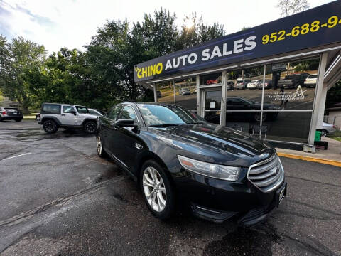 2013 Ford Taurus for sale at Chinos Auto Sales in Crystal MN