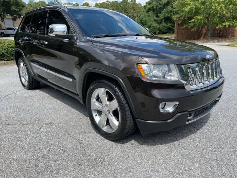 2012 Jeep Grand Cherokee for sale at United Luxury Motors in Stone Mountain GA
