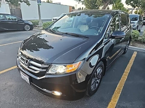 2016 Honda Odyssey for sale at Shamrock Group LLC #1 - Passenger Vans in Pleasant Grove UT