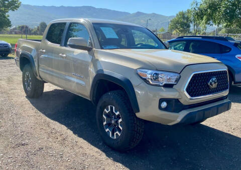 2018 Toyota Tacoma for sale at The Car-Mart in Bountiful UT