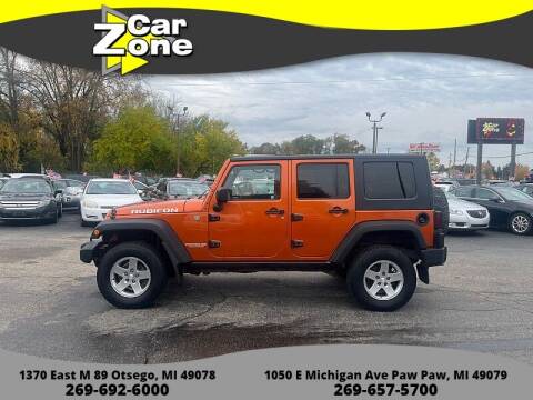 2010 Jeep Wrangler Unlimited for sale at Car Zone in Otsego MI