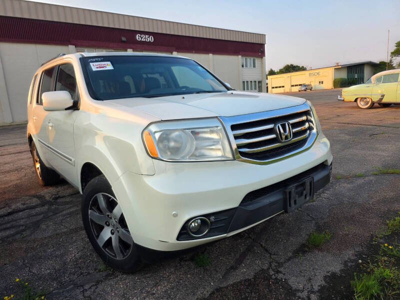 2015 Honda Pilot 4WD Touring w/RES & Navigation's photo