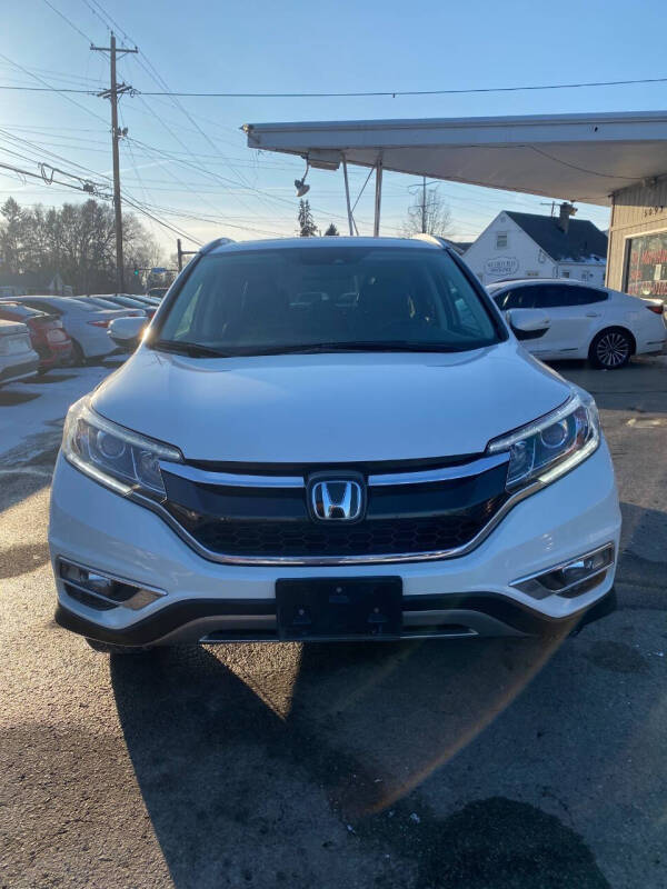 Used 2016 Honda CR-V Touring with VIN 5J6RM4H98GL110710 for sale in Hilliard, OH