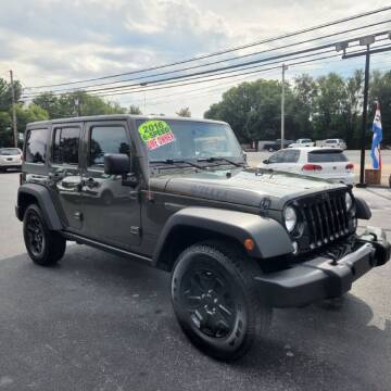 2016 Jeep Wrangler Unlimited for sale at Houser & Son Auto Sales in Blountville TN