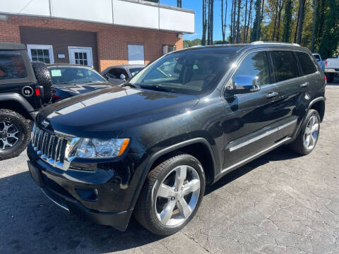 2012 Jeep Grand Cherokee for sale at Magic Motors Inc. in Snellville GA