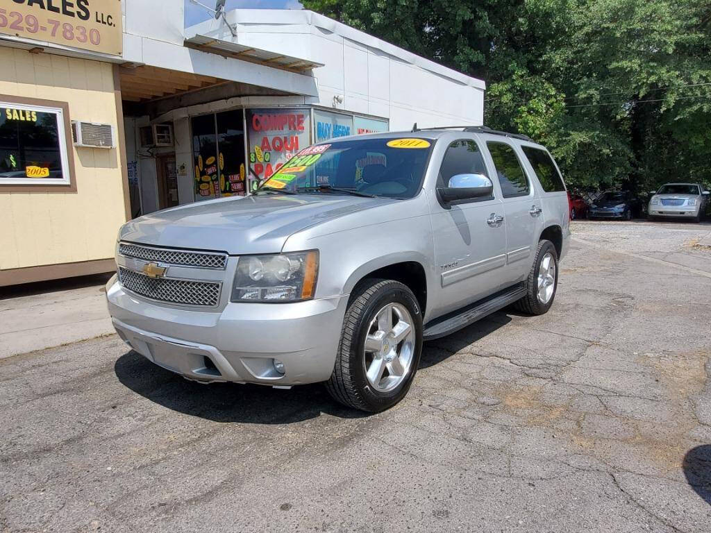 2011 Chevrolet Tahoe for sale at DAGO'S AUTO SALES LLC in Dalton, GA