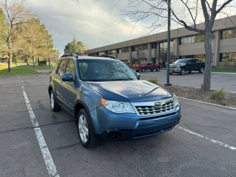 2010 Subaru Forester for sale at QUEST MOTORS in Englewood CO