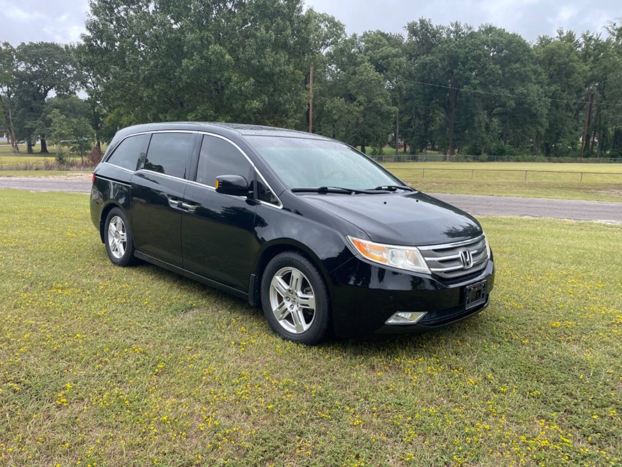 2011 Honda Odyssey for sale at Russell Brothers Auto Sales in Tyler, TX