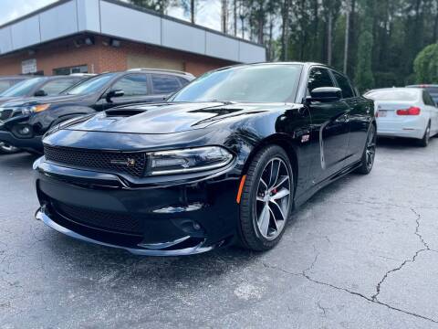 2016 Dodge Charger for sale at Magic Motors Inc. in Snellville GA