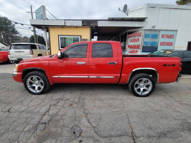 2005 Dodge Dakota for sale at DAGO'S AUTO SALES LLC in Dalton, GA