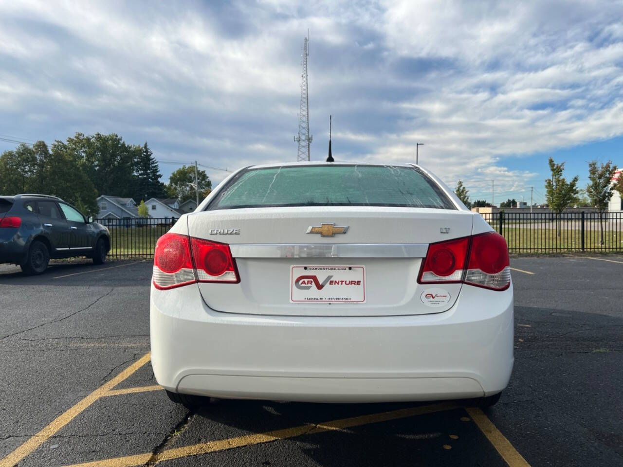 2014 Chevrolet Cruze for sale at Carventure in Lansing, MI