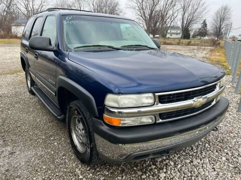 2002 Chevrolet Tahoe for sale at HEDGES USED CARS in Carleton MI