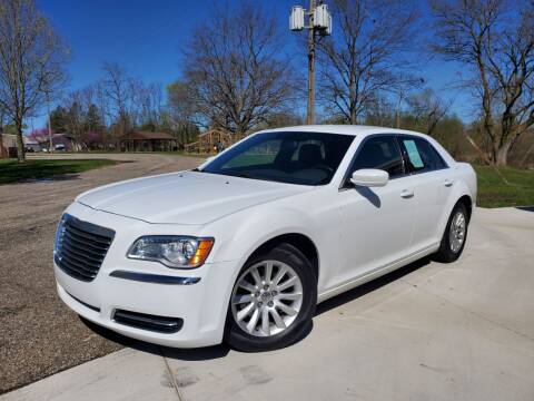 2013 Chrysler 300 for sale at COOP'S AFFORDABLE AUTOS LLC in Otsego MI