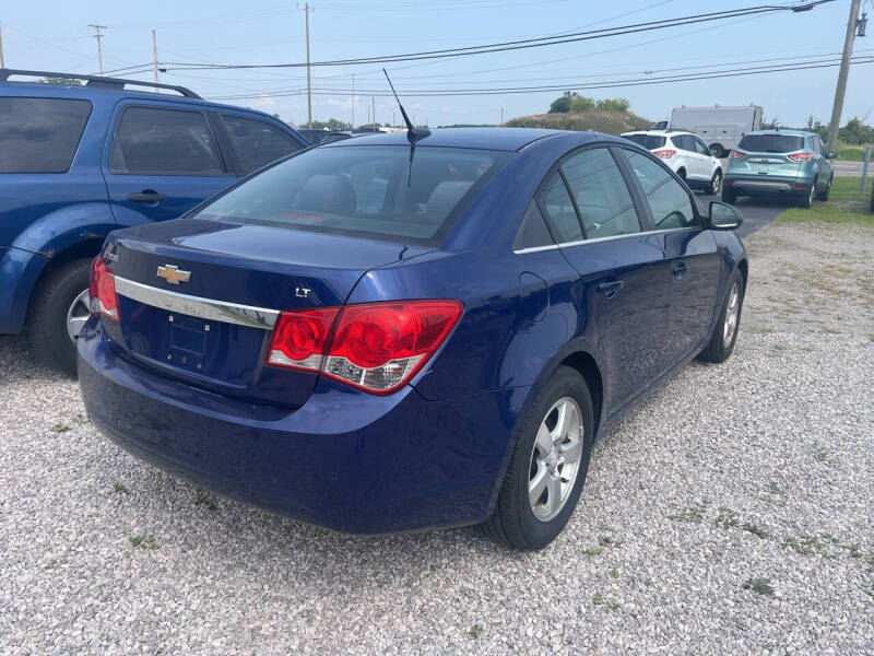 2012 Chevrolet Cruze for sale at HEDGES USED CARS in Carleton MI