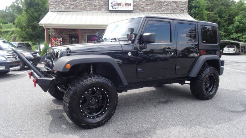 2012 Jeep Wrangler Unlimited for sale at Driven Pre-Owned in Lenoir NC