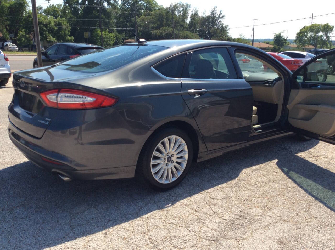 2016 Ford Fusion Hybrid for sale at SPRINGTIME MOTORS in Huntsville, TX