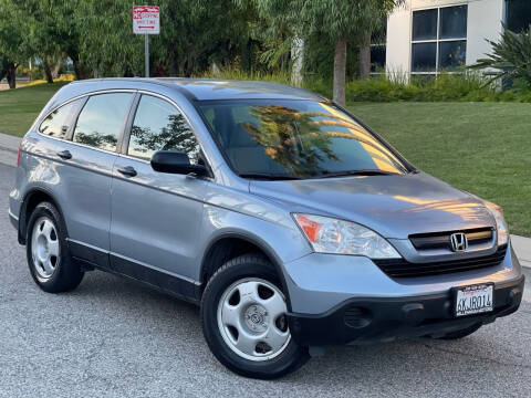 2009 Honda CR-V for sale at MILLENNIUM MOTORS in Van Nuys CA