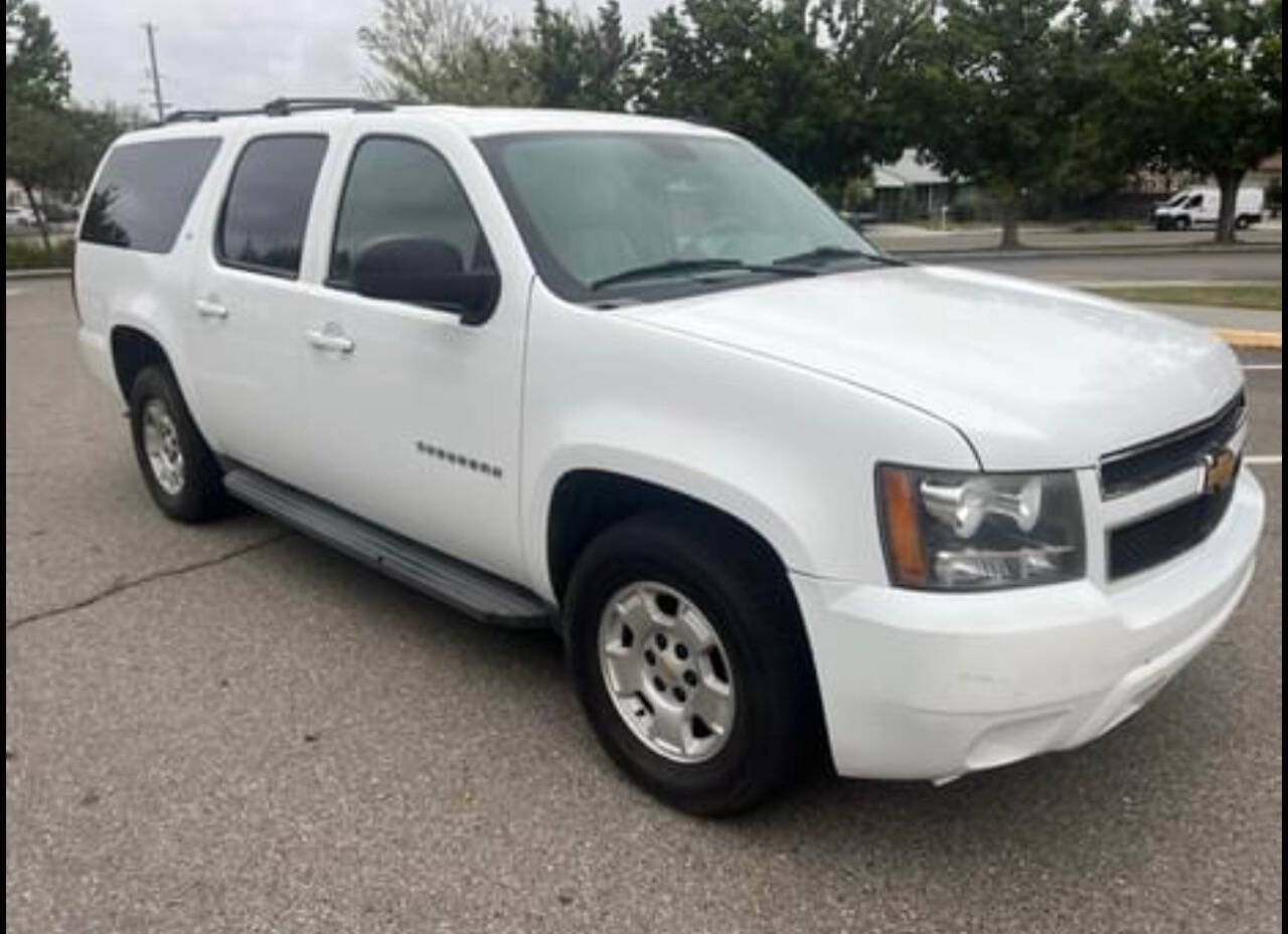 2012 Chevrolet Suburban for sale at AUTO 4 LESS in Fresno, CA