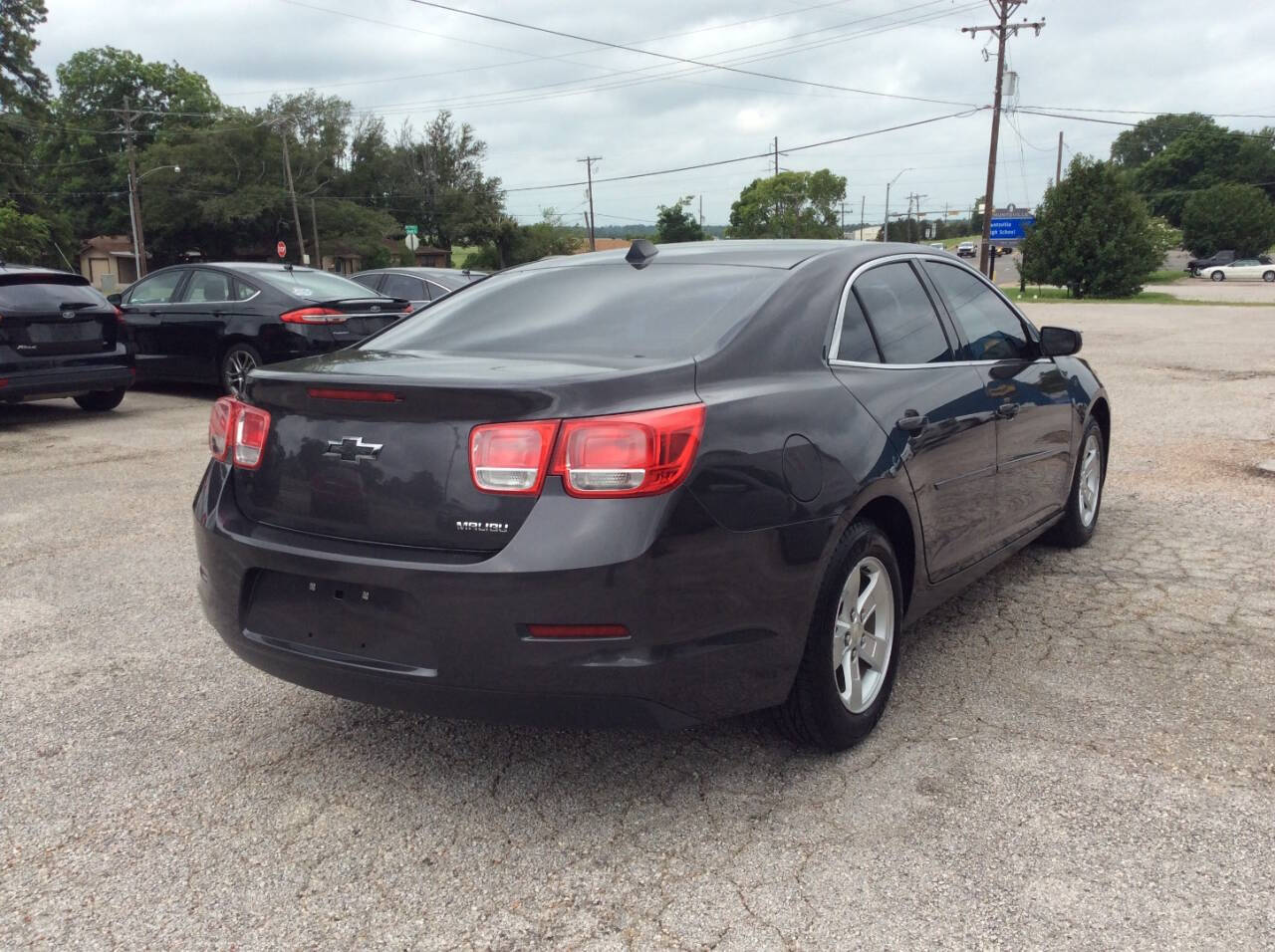 2013 Chevrolet Malibu for sale at SPRINGTIME MOTORS in Huntsville, TX