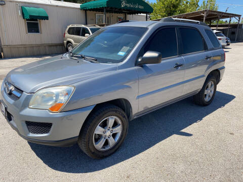 2009 Kia Sportage for sale at OASIS PARK & SELL in Spring TX