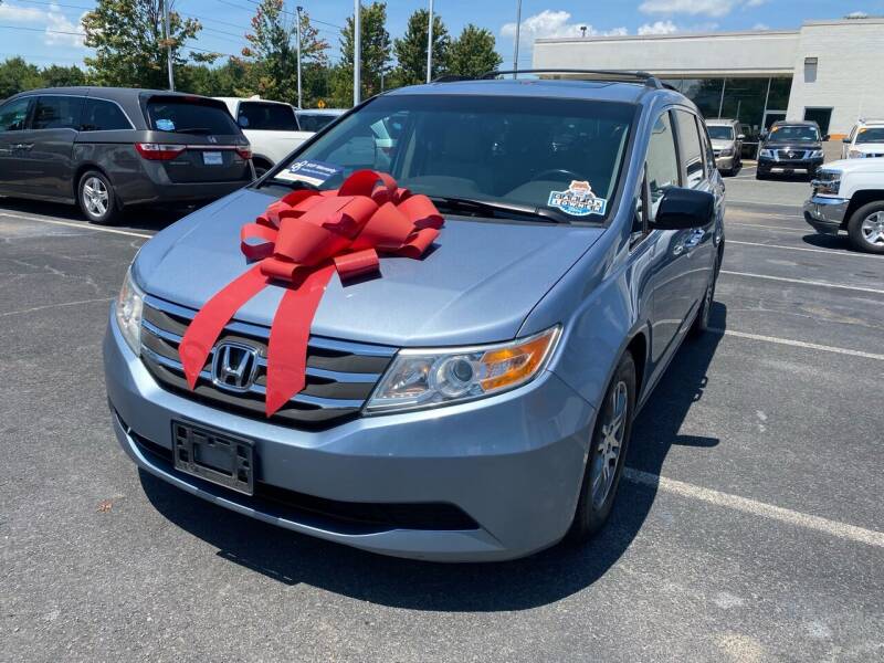 2013 Honda Odyssey for sale at Charlotte Auto Group, Inc in Monroe NC