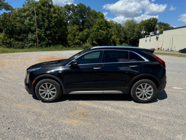 2021 Cadillac XT4 for sale at Guadalupe Auto Sales, LLC. in Jemison, AL