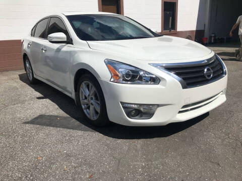 2013 Nissan Altima for sale at WHEEL UNIK AUTOMOTIVE & ACCESSORIES INC in Winter Park FL