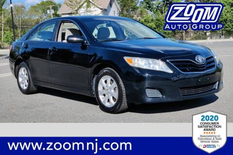 2011 Toyota Camry for sale at Zoom Auto Group in Parsippany NJ