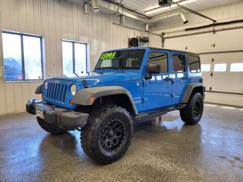 2011 Jeep Wrangler Unlimited for sale at Sand's Auto Sales in Cambridge MN