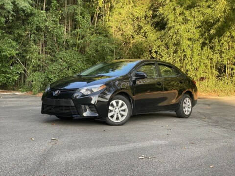 2014 Toyota Corolla for sale at Uniworld Auto Sales LLC. in Greensboro NC