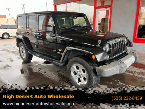 2014 Jeep Wrangler Unlimited for sale at High Desert Auto Wholesale in Albuquerque NM
