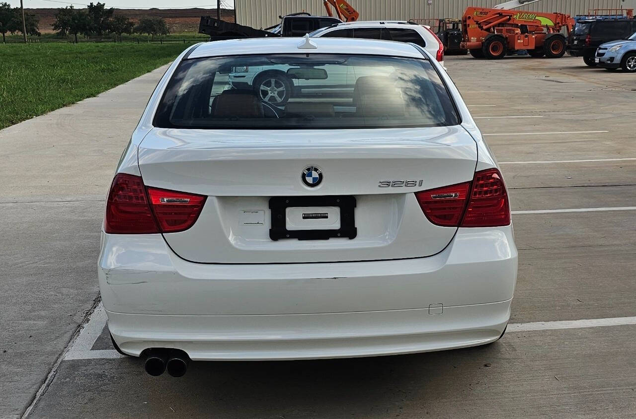 2011 BMW 3 Series for sale at CAR MARKET AUTO GROUP in Sugar Land, TX