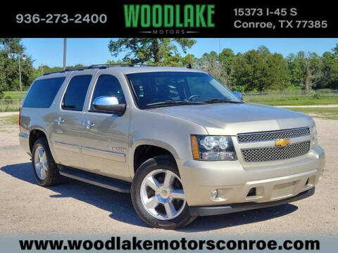 2014 Chevrolet Suburban for sale at WOODLAKE MOTORS in Conroe TX