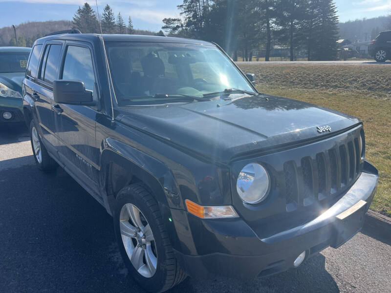 2014 Jeep Patriot for sale at BURNWORTH AUTO INC in Windber PA