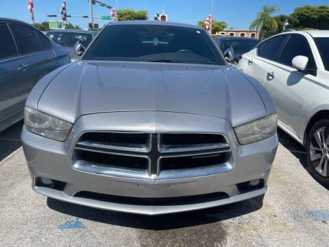 2014 Dodge Charger for sale at America Auto Wholesale Inc in Miami FL