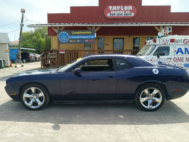 2014 Dodge Challenger for sale at Taylor Trading Co in Beaumont TX