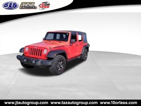 2013 Jeep Wrangler Unlimited for sale at J T Auto Group in Sanford NC