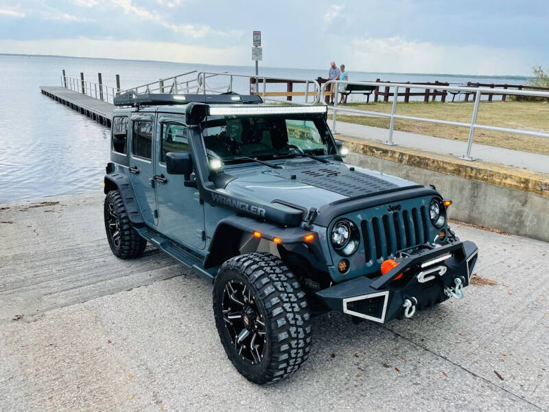 2015 Jeep Wrangler Unlimited for sale at Santana Auto in Altamonte Springs FL