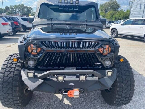 2017 Jeep Wrangler Unlimited for sale at ARENA AUTO SALES,  INC. in Holly Hill FL
