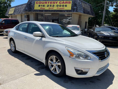 2013 Nissan Altima for sale at Courtesy Cars in Independence MO