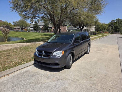 2017 Dodge Grand Caravan for sale at Essence Autos in Spring TX