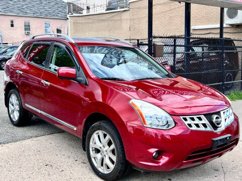 2013 Nissan Rogue for sale at King Of Kings Used Cars in North Bergen NJ